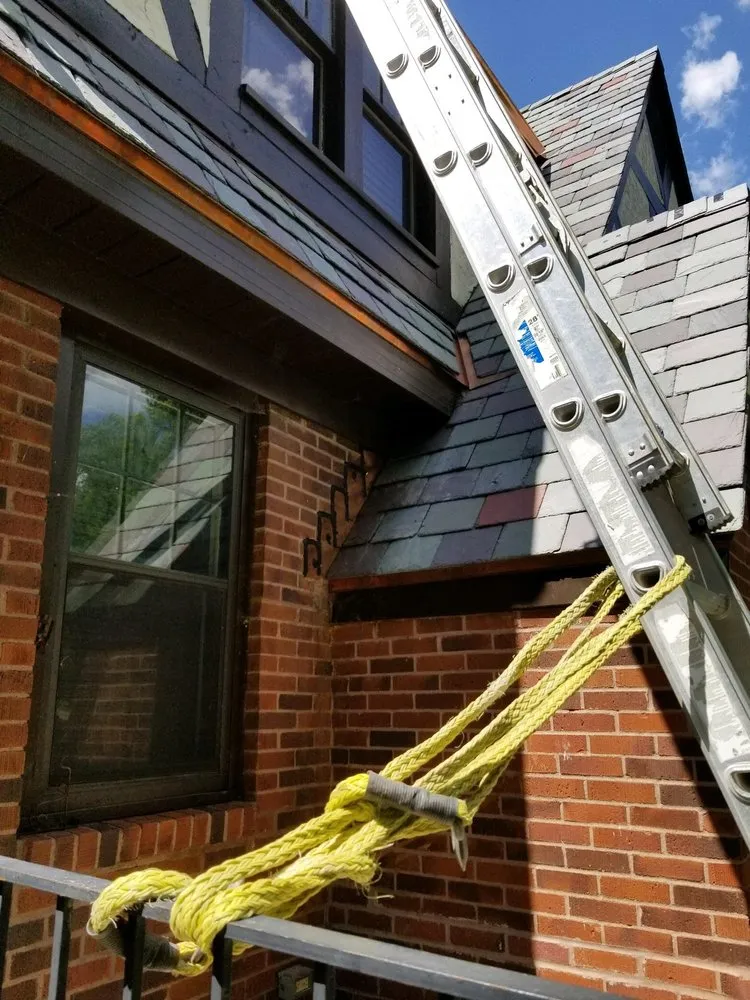 Slide of Andy's Roofing Company