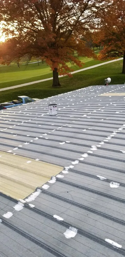 Slide of Andy's Roofing Company