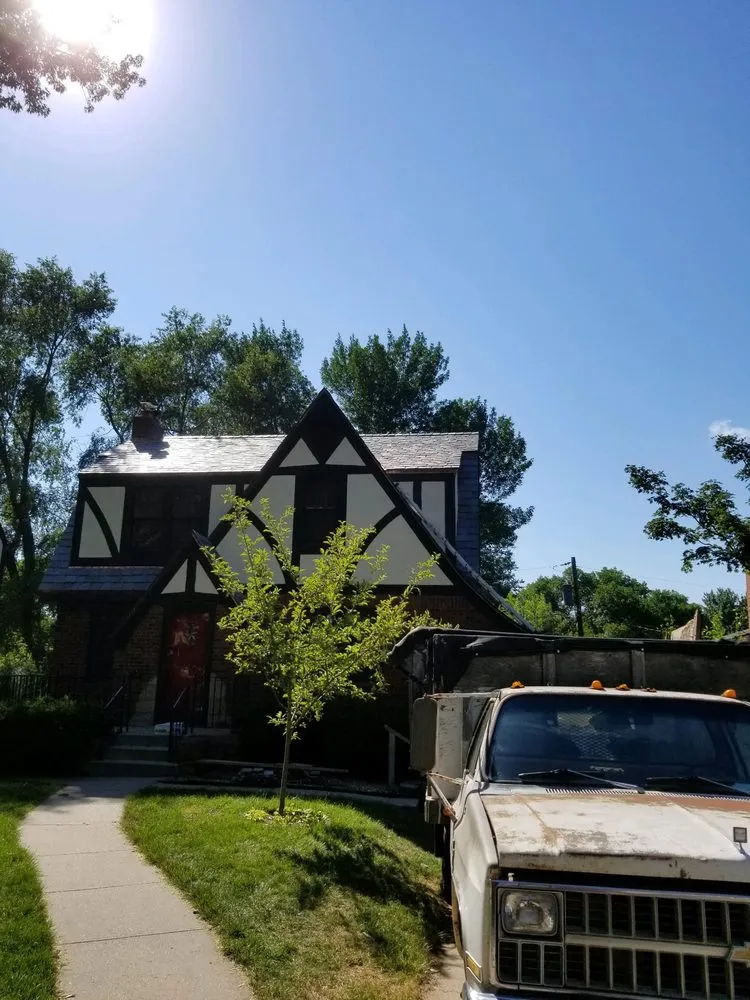 Slide of Andy's Roofing Company