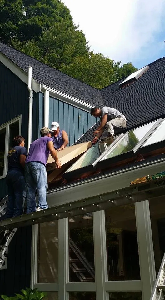 Slide of Andy's Roofing