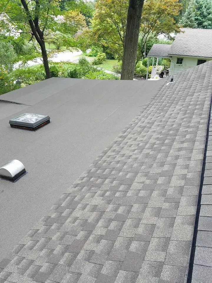 Slide of Andy's Roofing