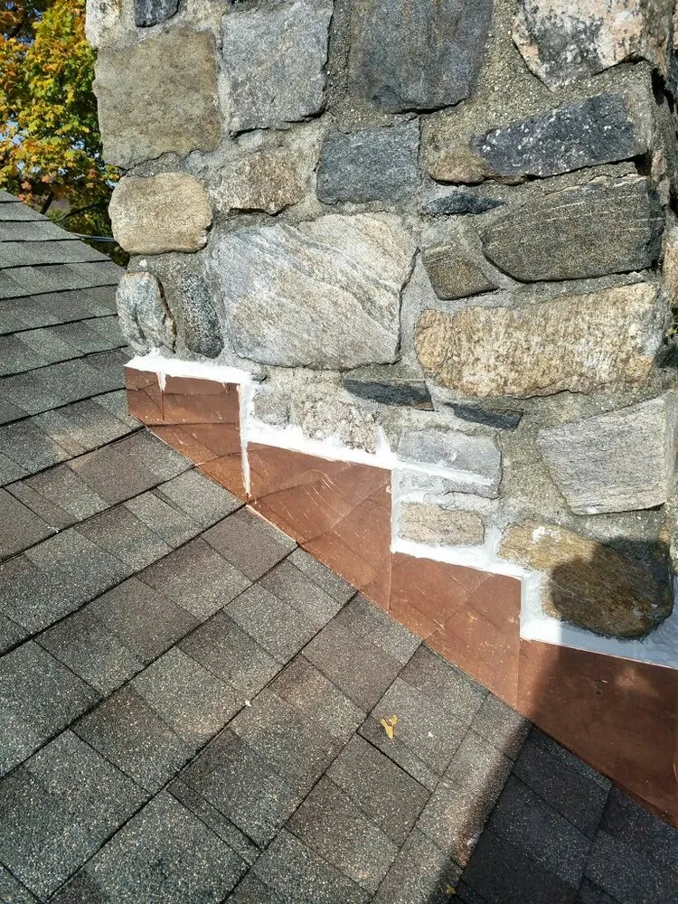 Slide of Andy's Roofing