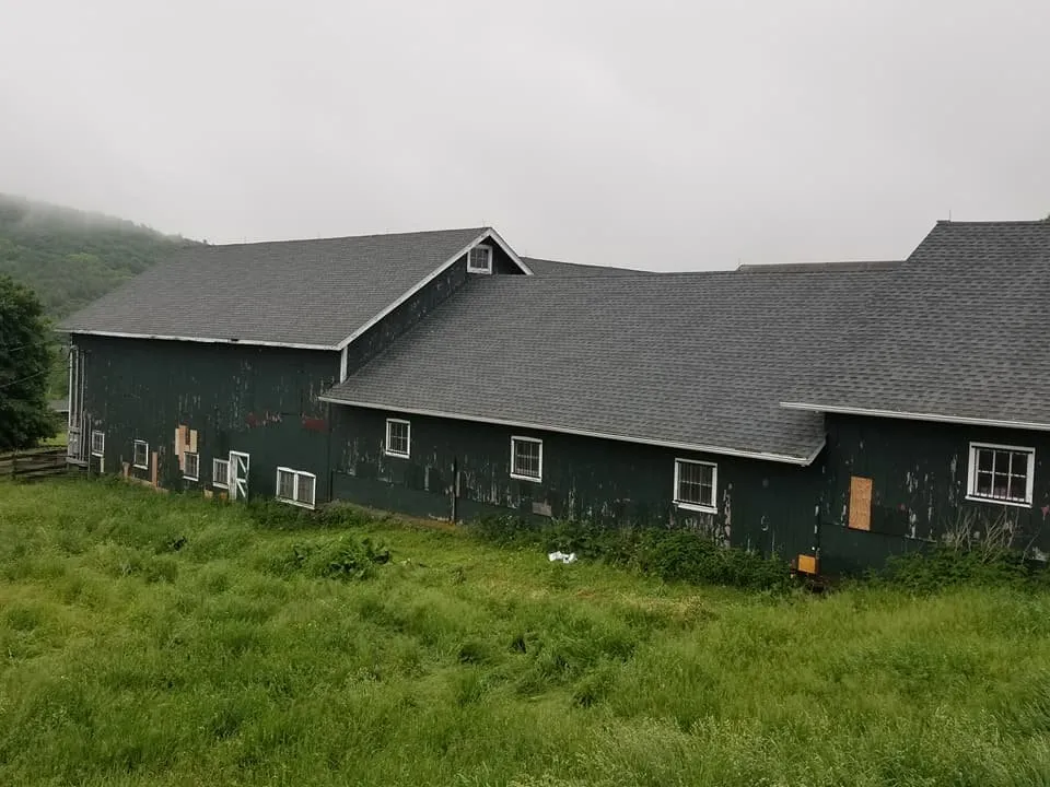 Slide of Andy's Roofing