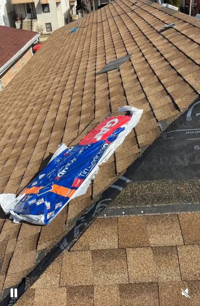 Slide of Angelicas Roofing