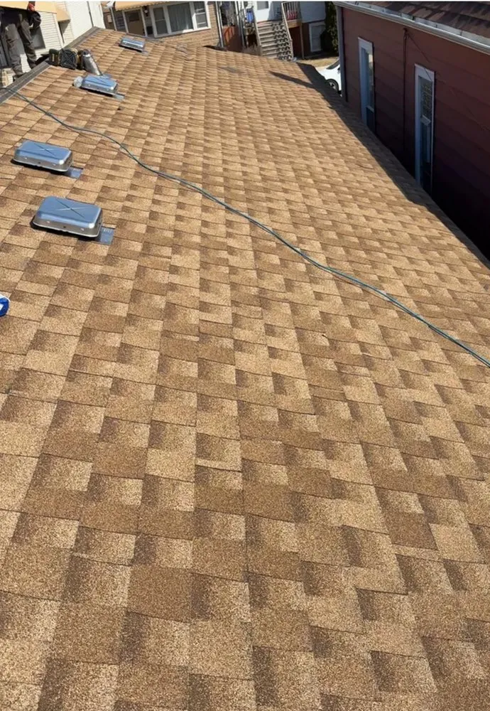 Slide of Angelicas Roofing