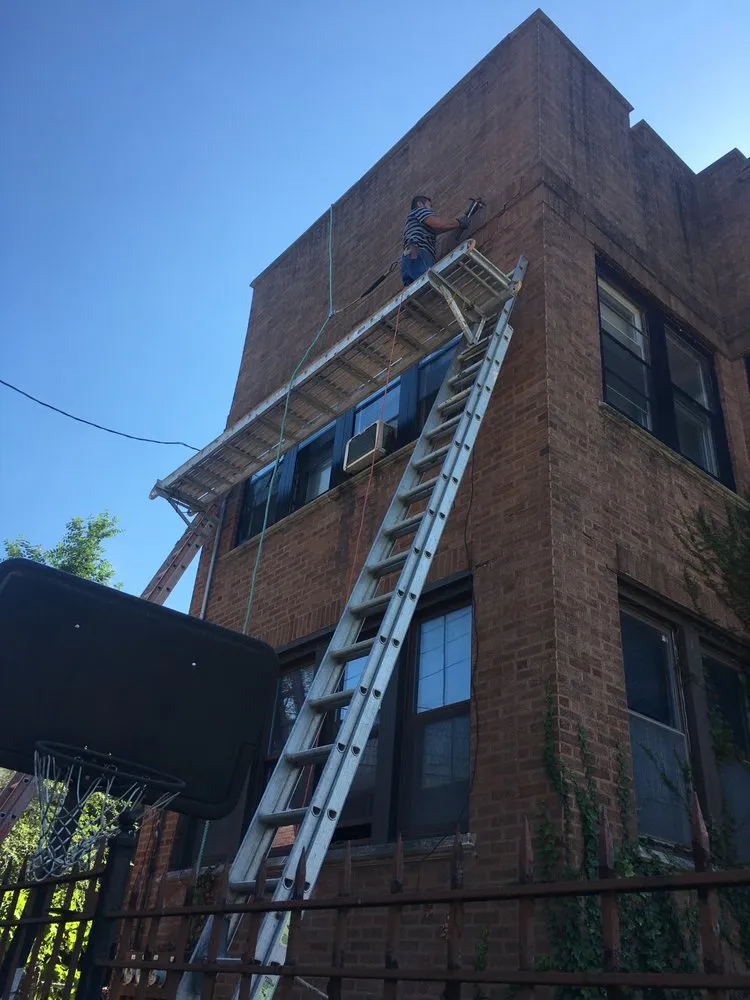 Slide of Angelos Roofing & Construction