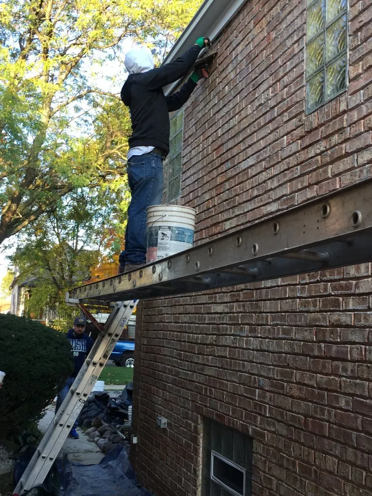 Slide of Angelos Roofing & Construction