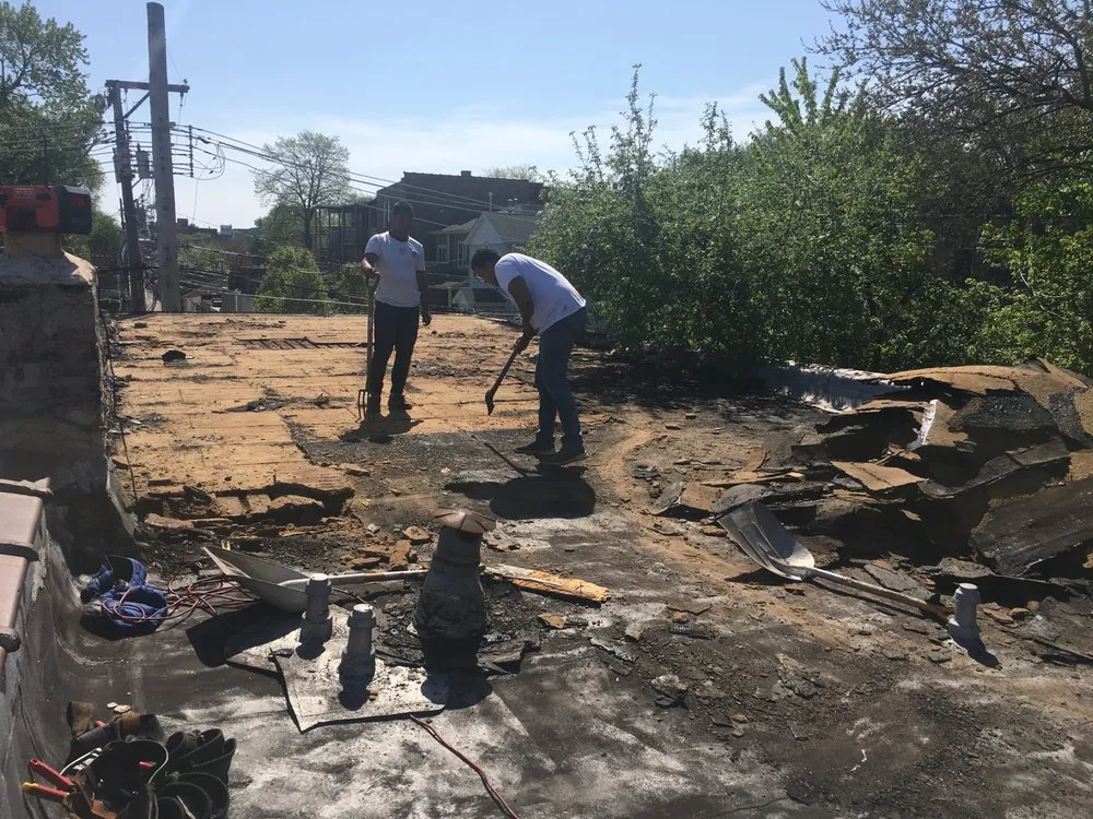 Slide of Angelos Roofing & Construction