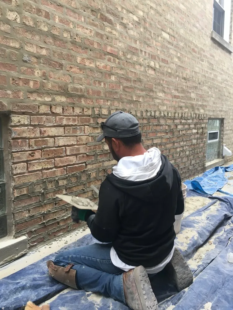 Slide of Angelos Roofing & Construction