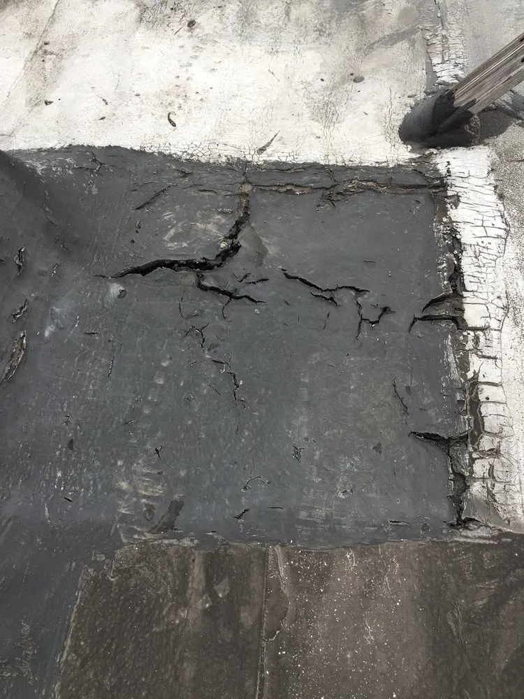 Slide of Angelos Roofing & Construction