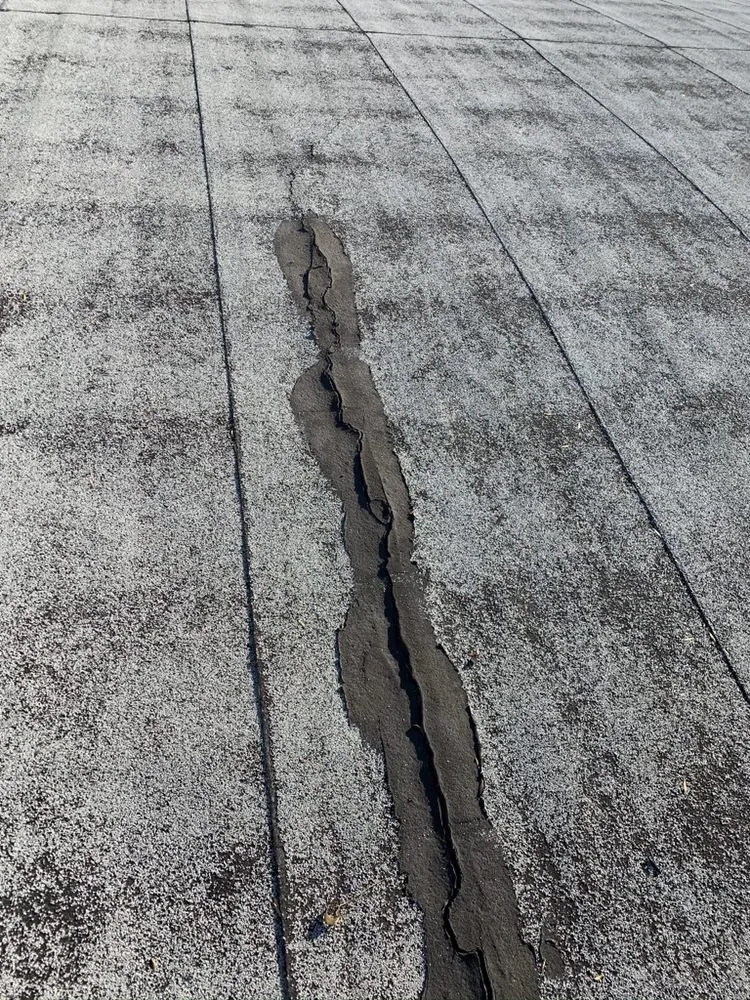 Slide of Angelo's Roofing