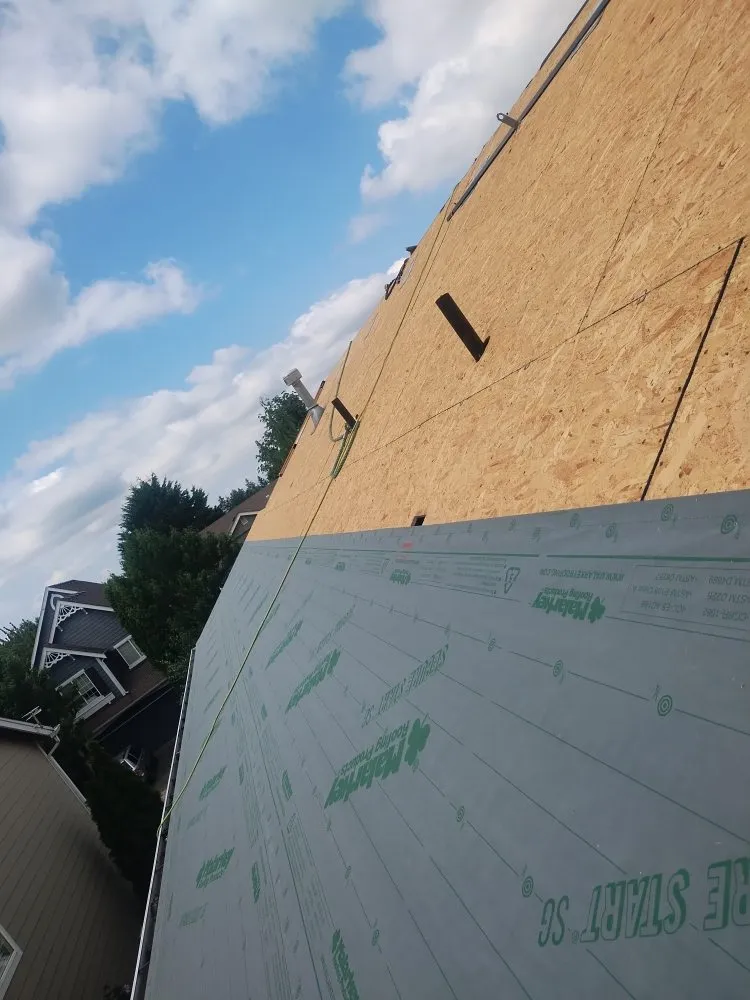 Slide of Anibal's Roofing