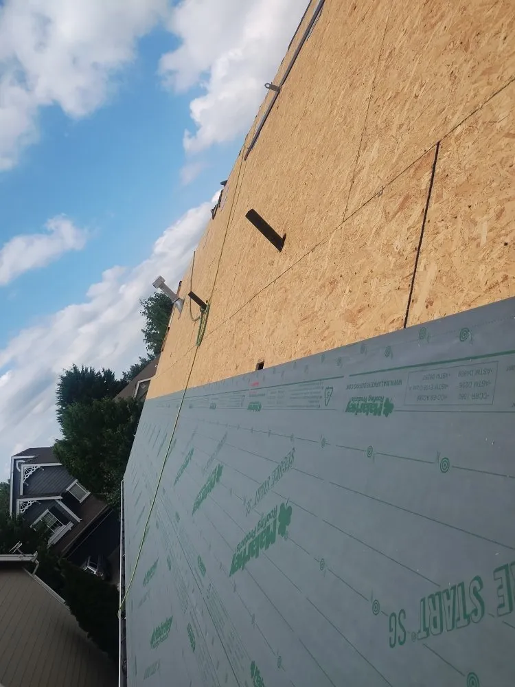 Slide of Anibal's Roofing