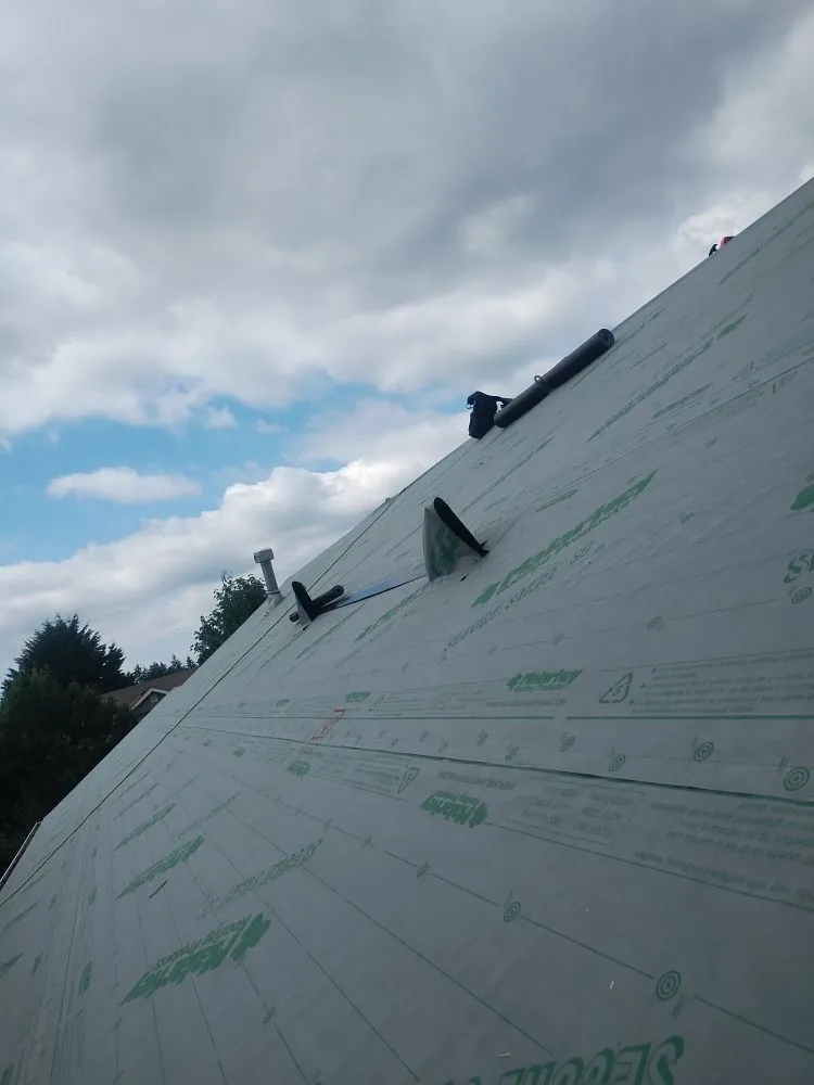 Slide of Anibal's Roofing