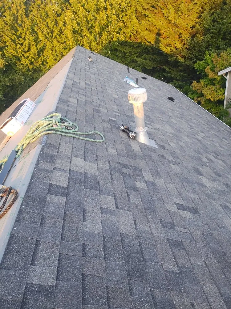 Slide of Anibal's Roofing