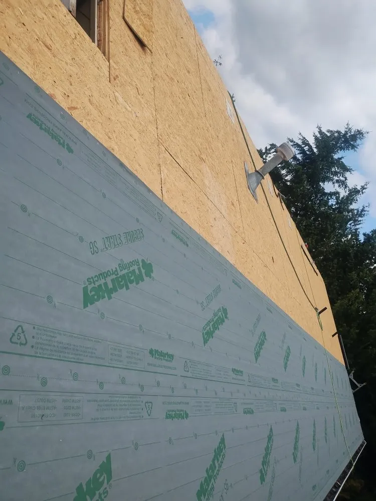 Slide of Anibal's Roofing