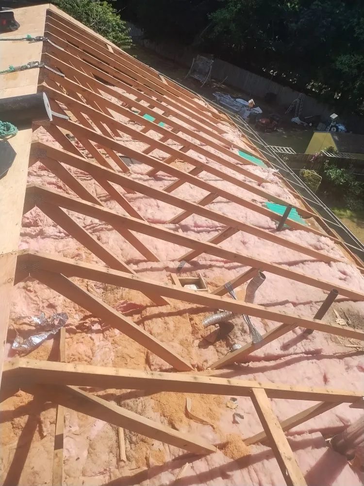 Slide of Anibal's Roofing