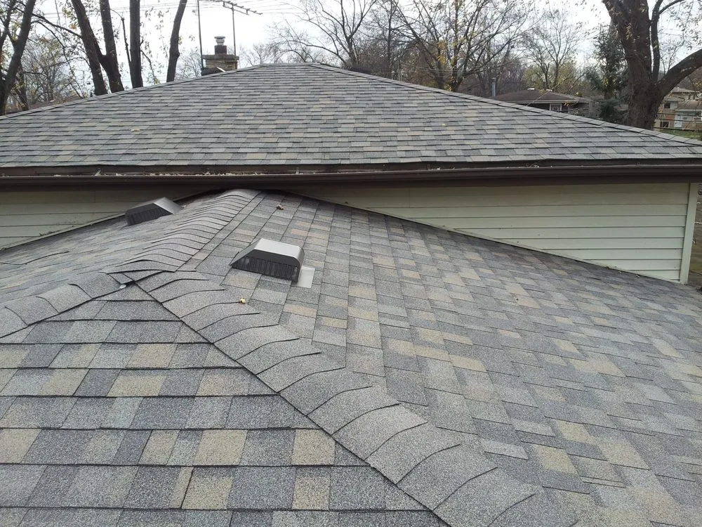 Slide of ANS Roofing & Siding