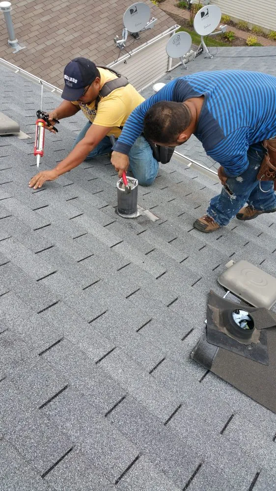 Slide of ANS Roofing & Siding