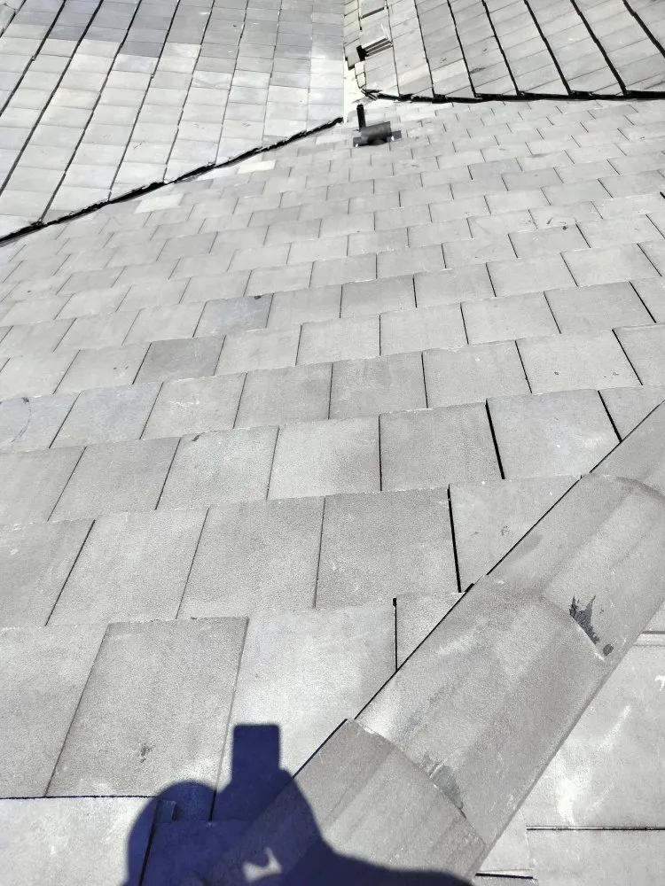 Slide of Antonio Roofing