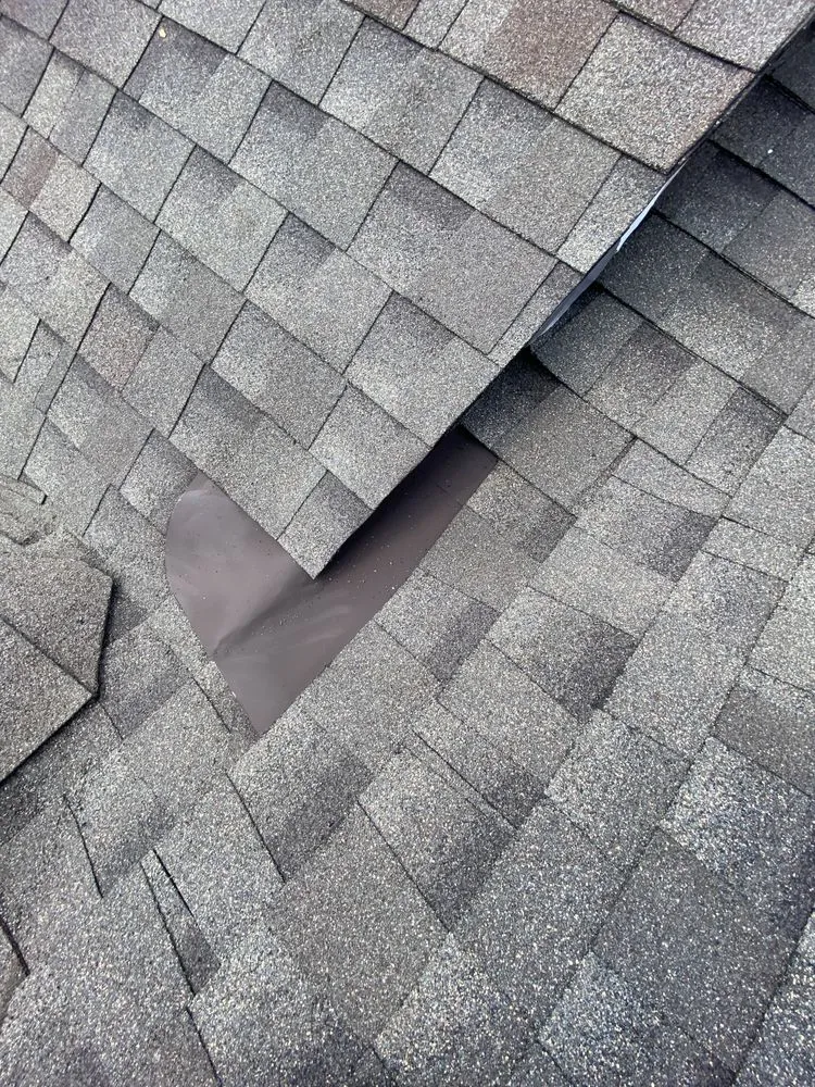 Slide of Antonio’s Roofing Repairs