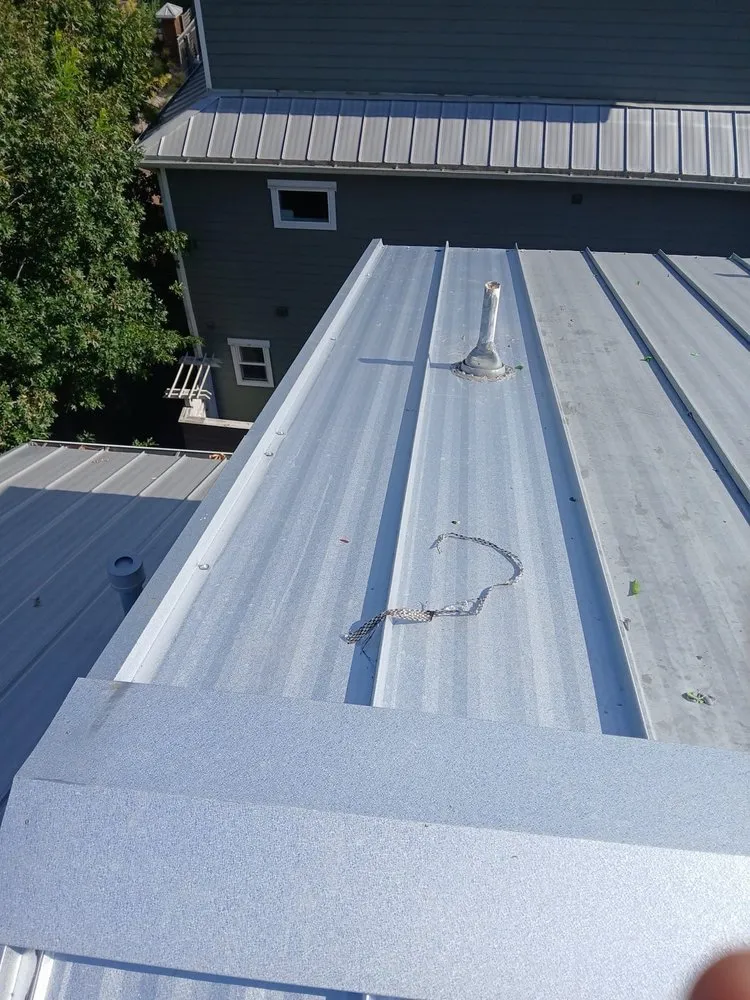 Slide of Anvil Roofers