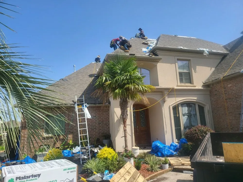 Slide of Anything & Everything Roofing