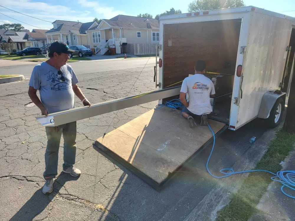 Slide of Anything & Everything Roofing