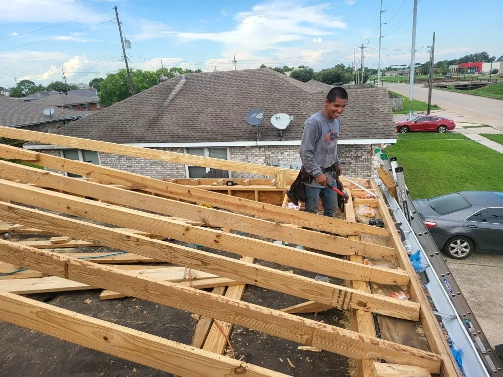 Slide of Anything & Everything Roofing