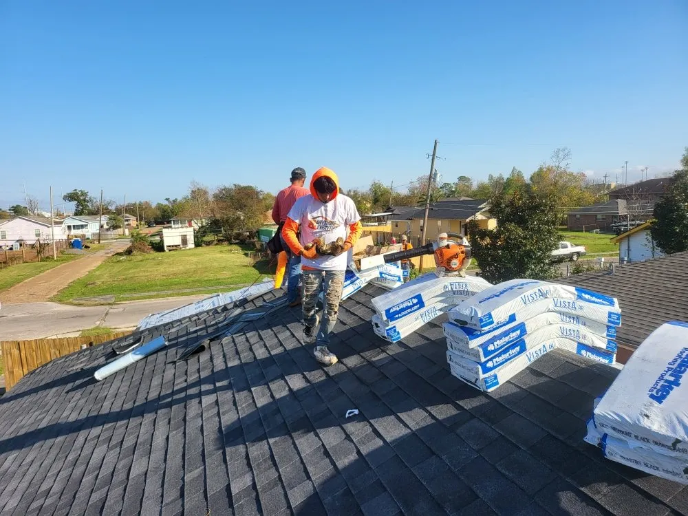 Slide of Anything & Everything Roofing