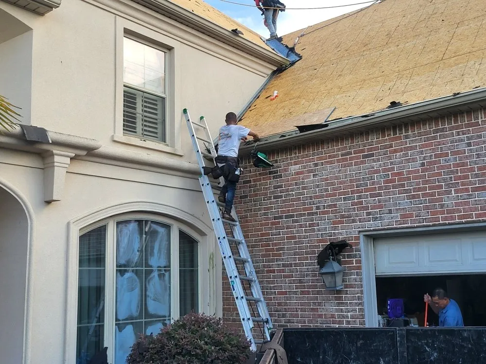 Slide of Anything & Everything Roofing