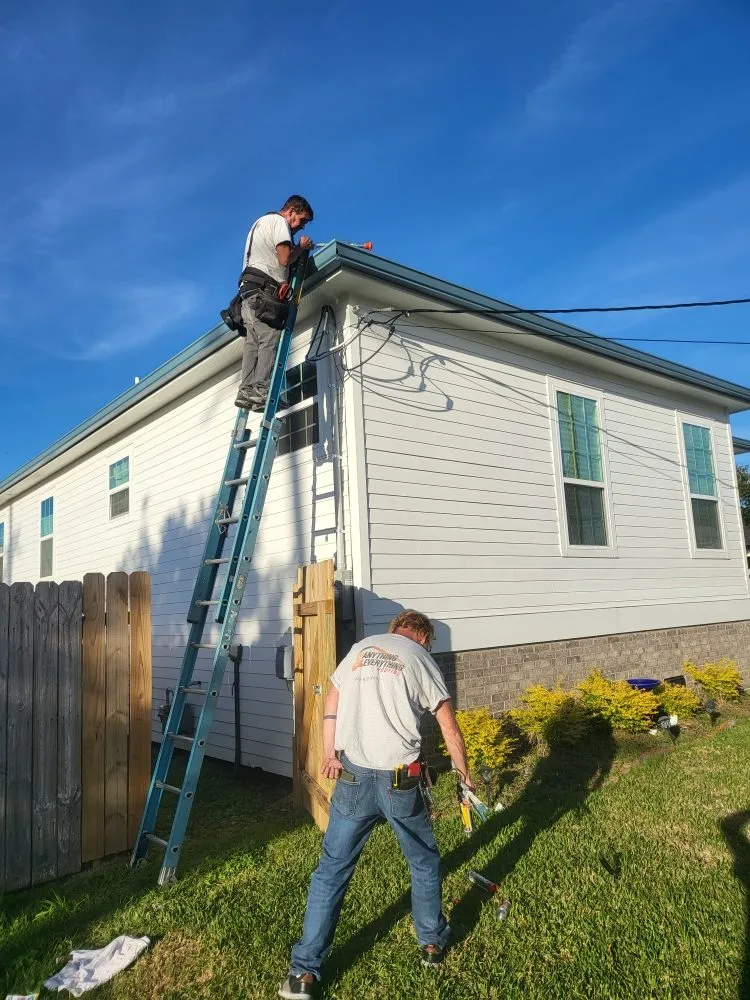 Slide of Anything & Everything Roofing