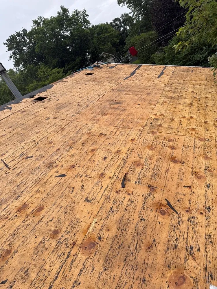 Slide of Anything Roofing and Construction