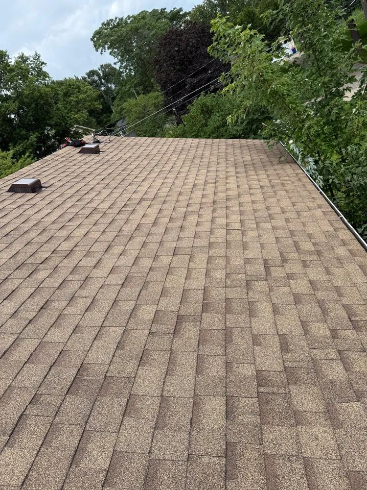 Slide of Anything Roofing and Construction