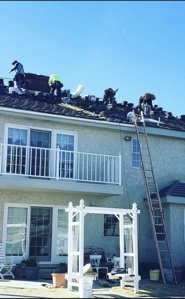 Slide of Apache Roofing