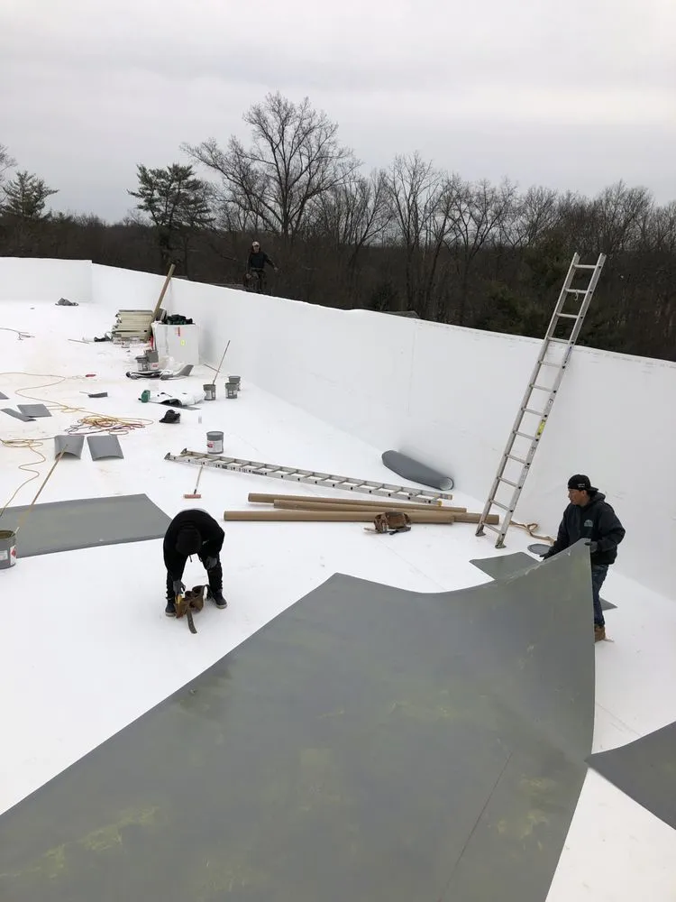 Slide of Apex Commercial Roofing