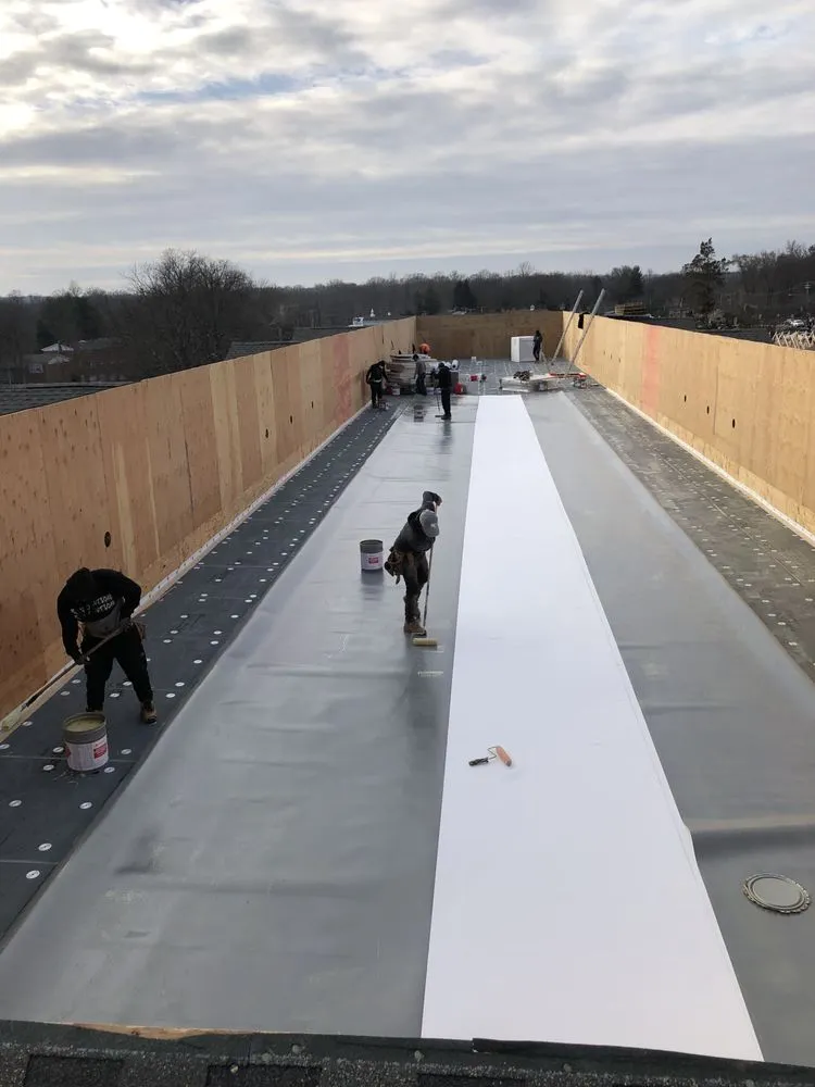 Slide of Apex Commercial Roofing