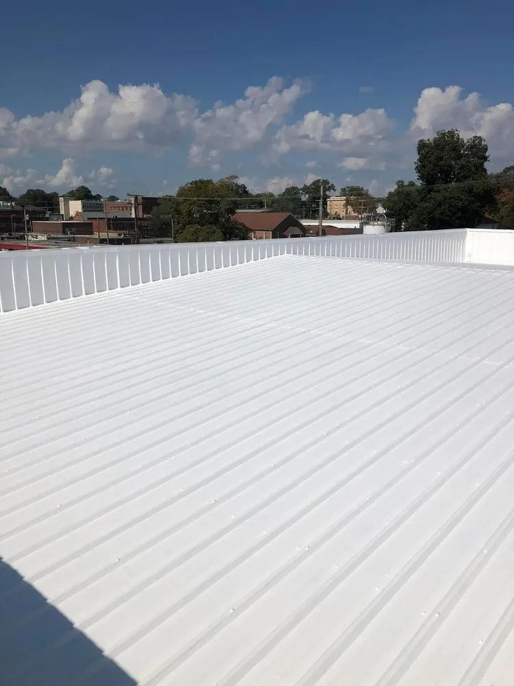 Slide of Apex Commercial Roofing