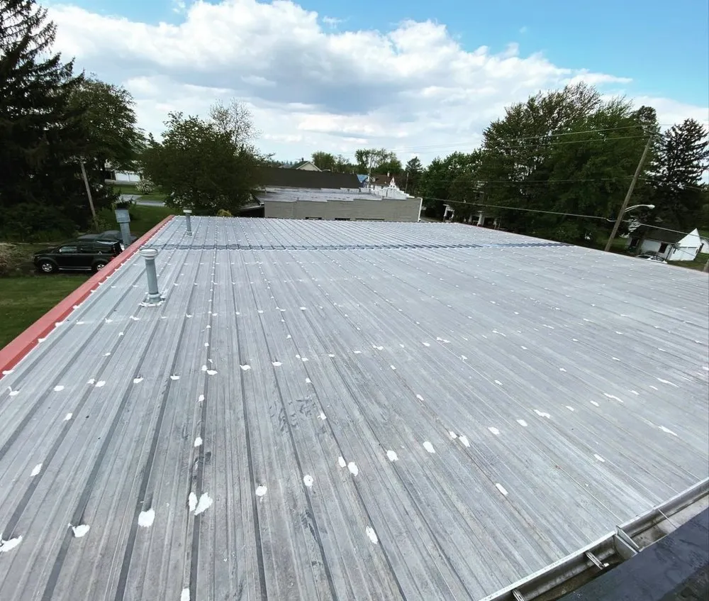 Slide of Apex Commercial Roofing