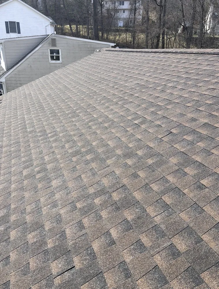 Slide of Apex Roofing Solutions