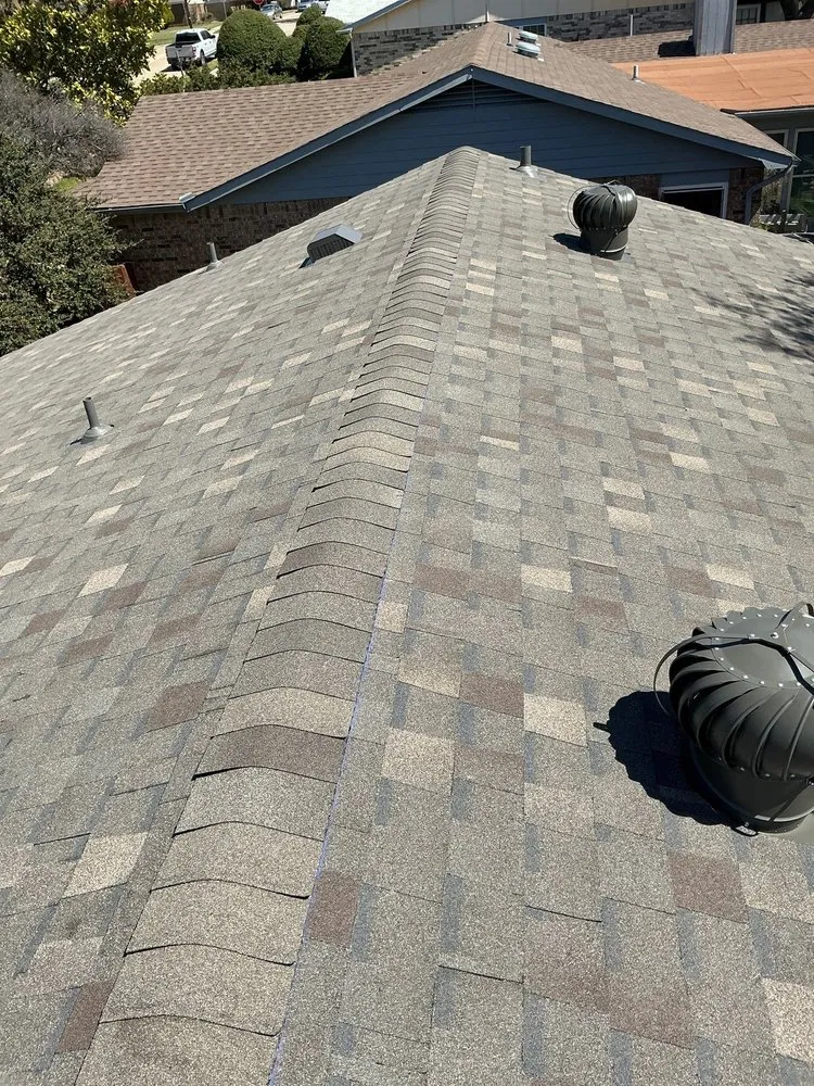 Slide of Apogee Roofing