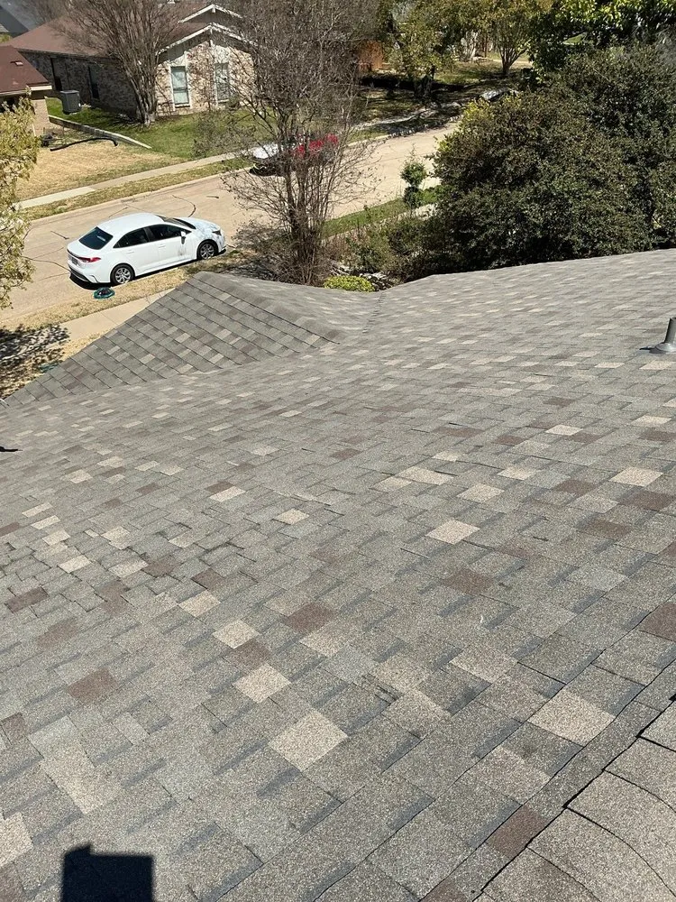 Slide of Apogee Roofing