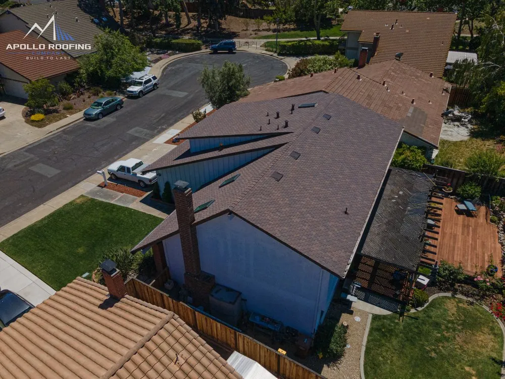 Slide of Apollo Roofing Company