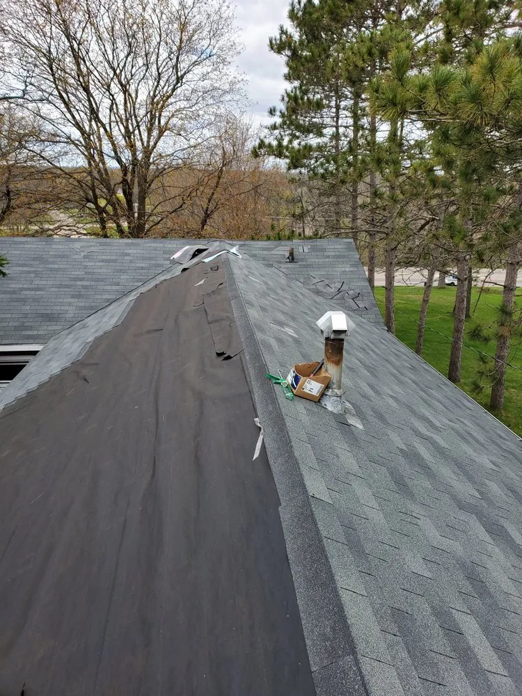 Slide of Apostle Roofing company