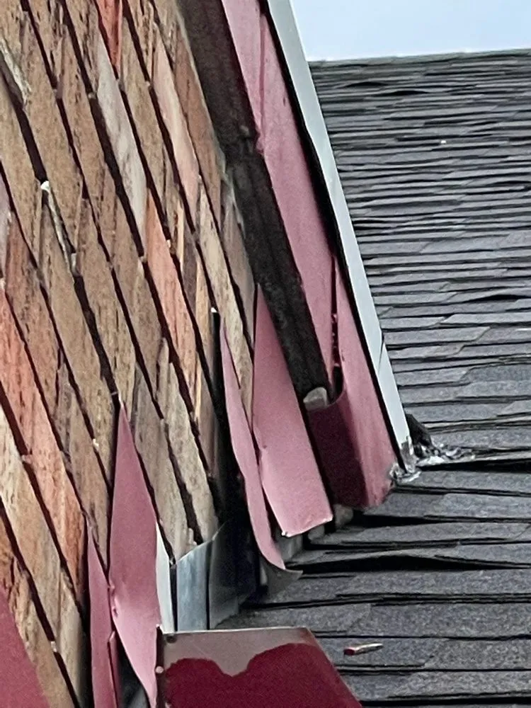 Slide of Apple Roofing