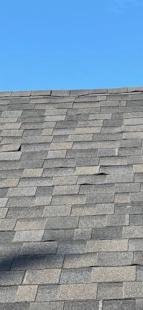 Slide of Apple Roofing