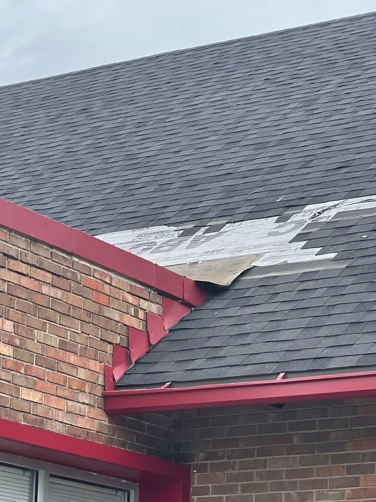 Slide of Apple Roofing