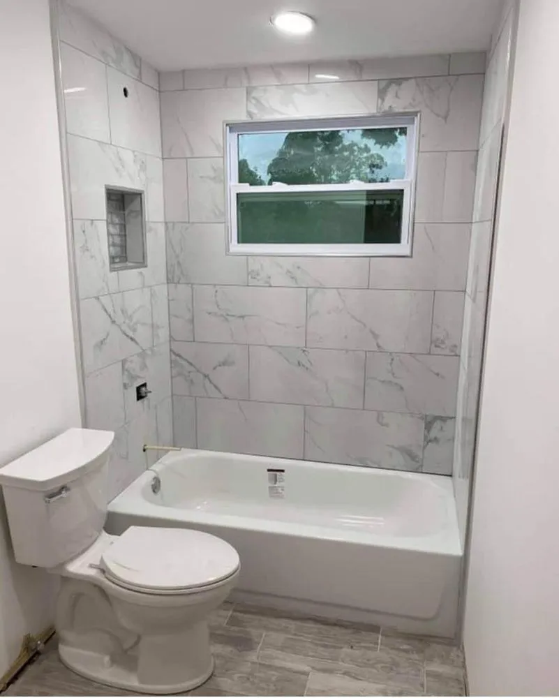 Slide of Approved Roofing & Construction