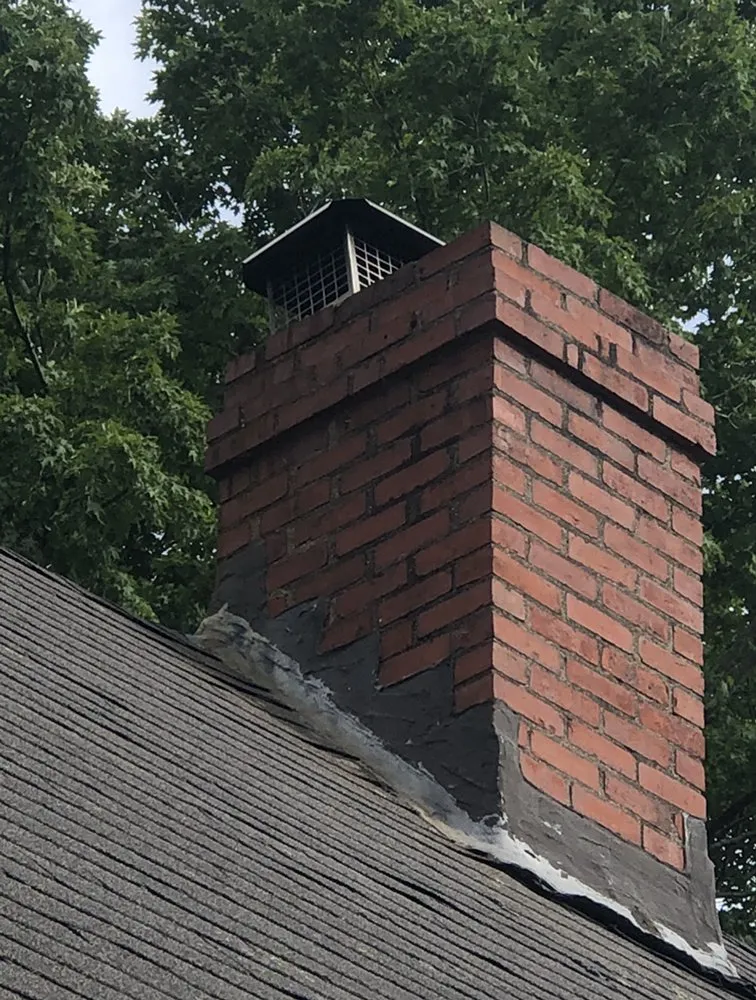 Slide of Approved Roofing & Construction