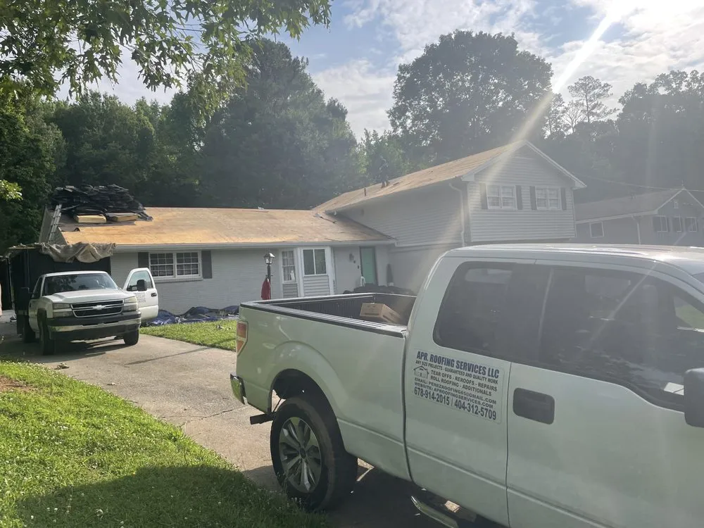 Slide of APR Roofing Service